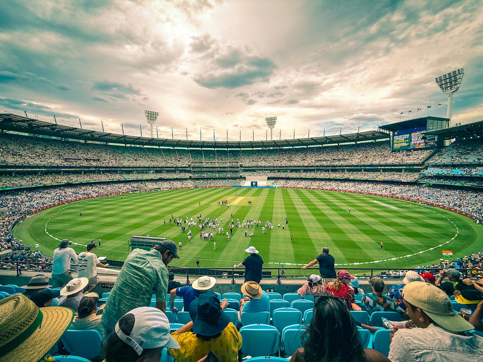 Cricket match in progress at the Melbourne Cricket Ground (MCG)