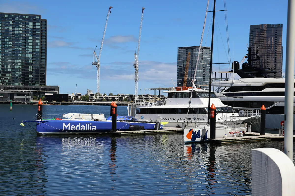 People rowing and sailing on Albert Park Lake in Melbourne