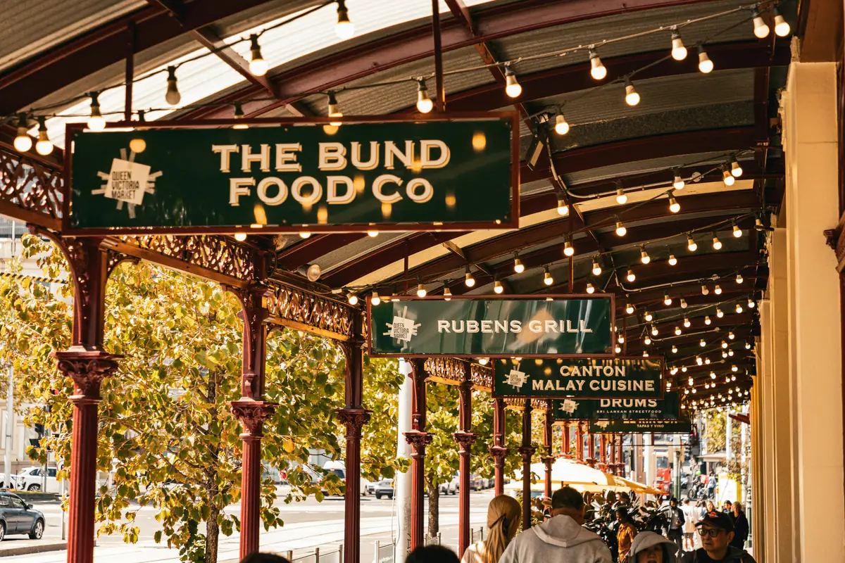 A cafe and shoppers on Chapel Street Melbourne