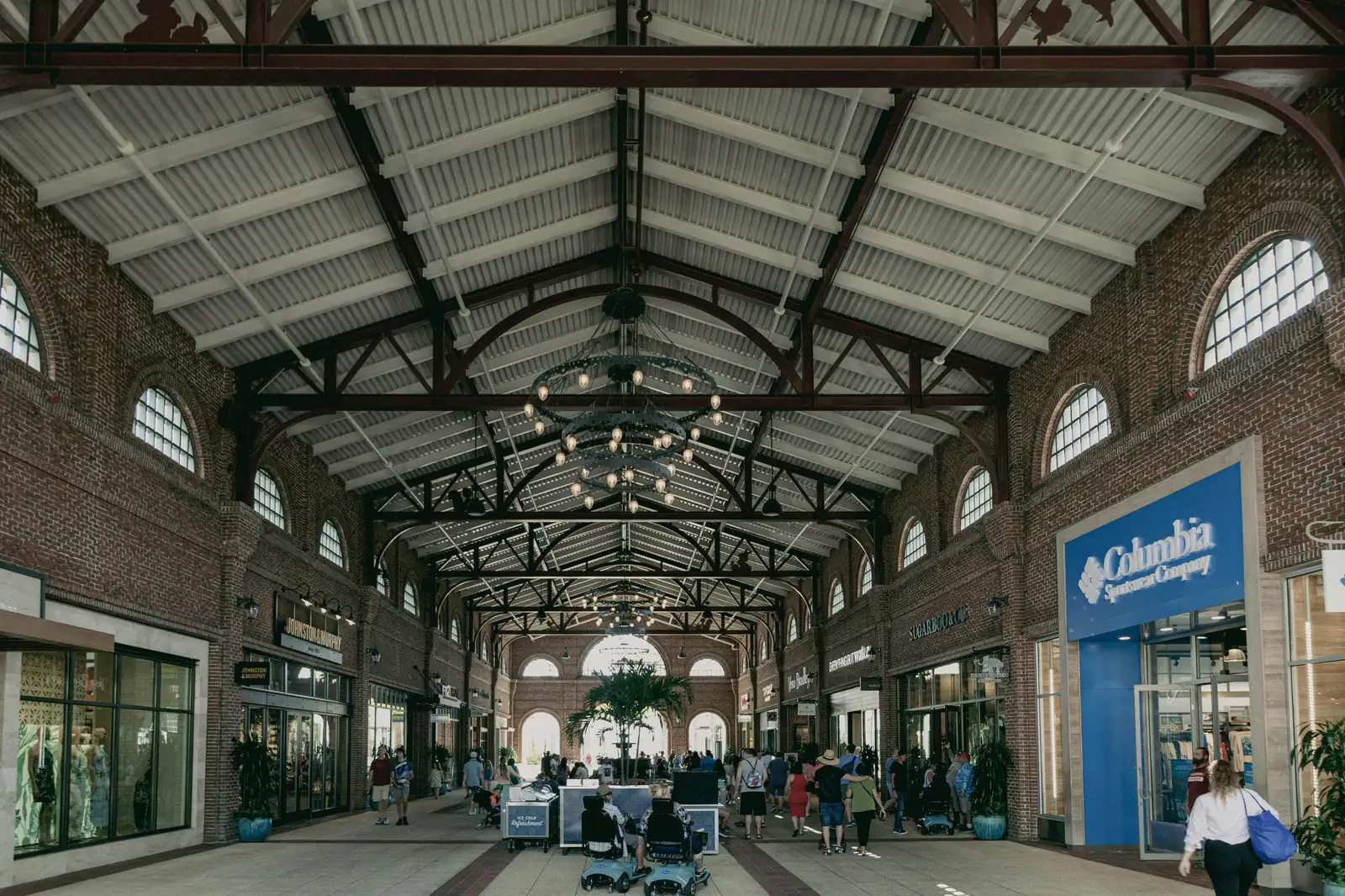 Shoppers at a DFO outlet centre in Melbourne with brand stores