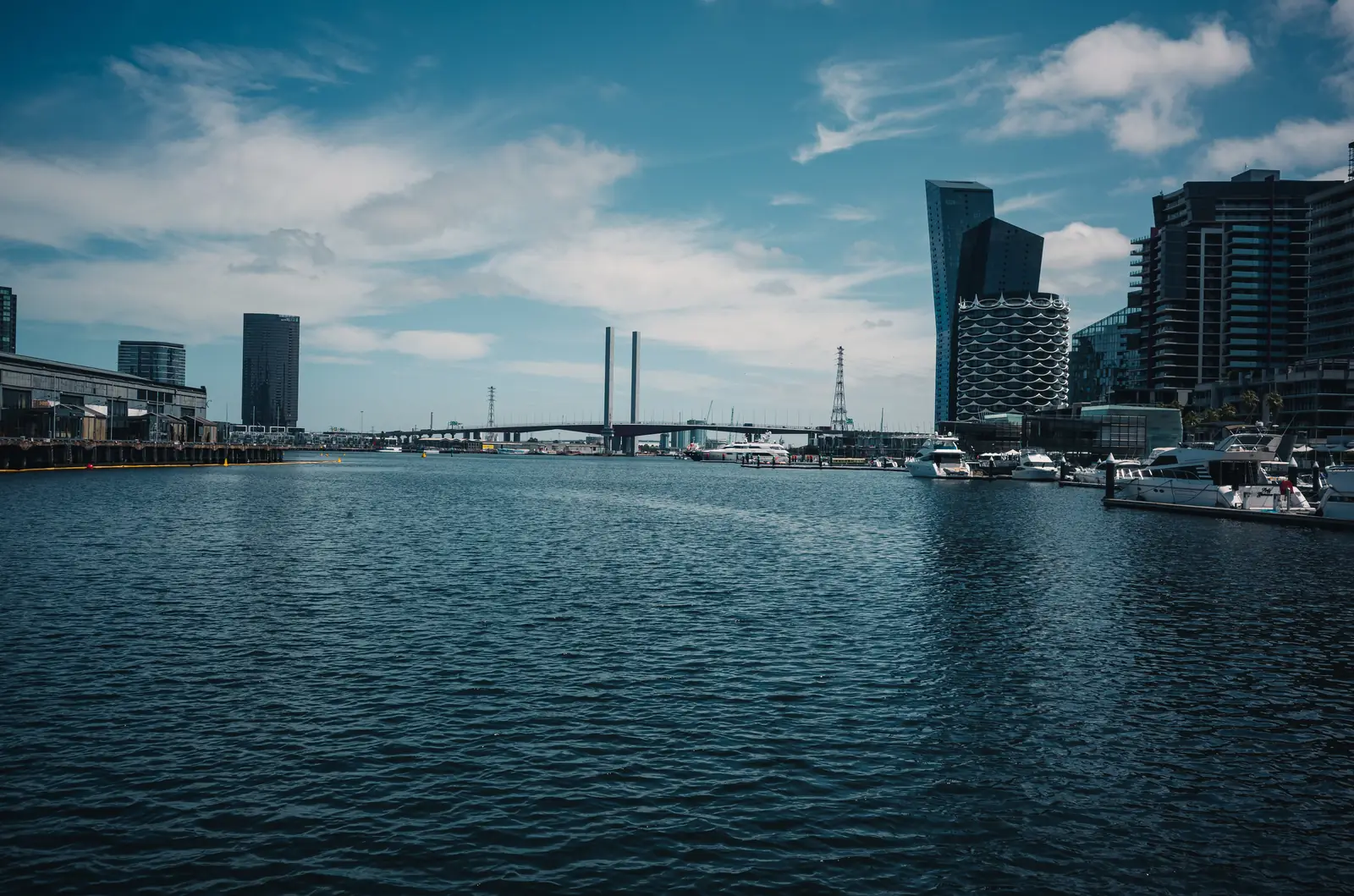 The Docklands waterfront in Melbourne with the harbour and city