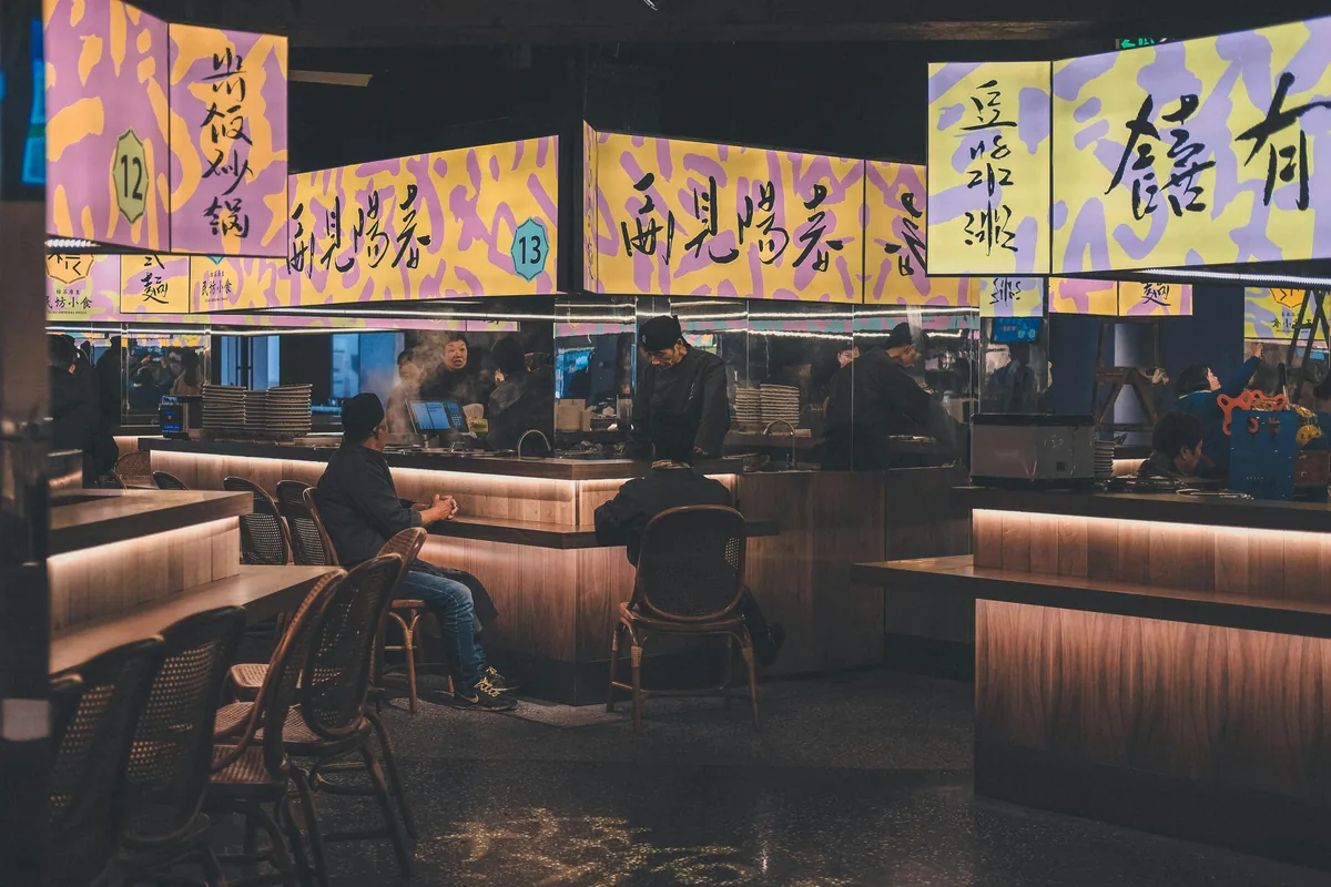 The food hall at Emporium Melbourne with diners