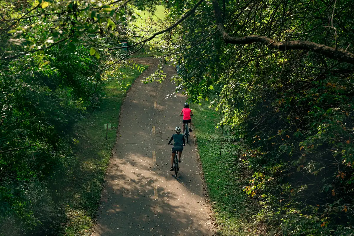 Cyclists on the Capital City Trail beside the Yarra River in Melbourne