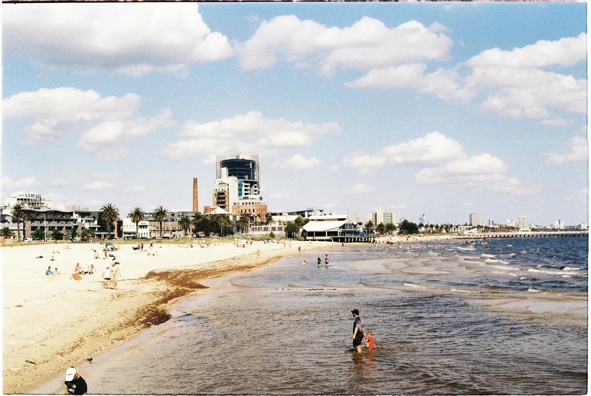 People enjoying a summer beach day near Melbourne in December