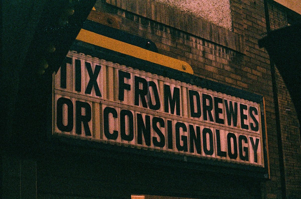 A vintage cinema marquee at night