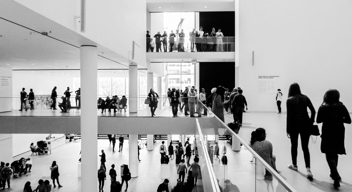 Visitors inside an art gallery
