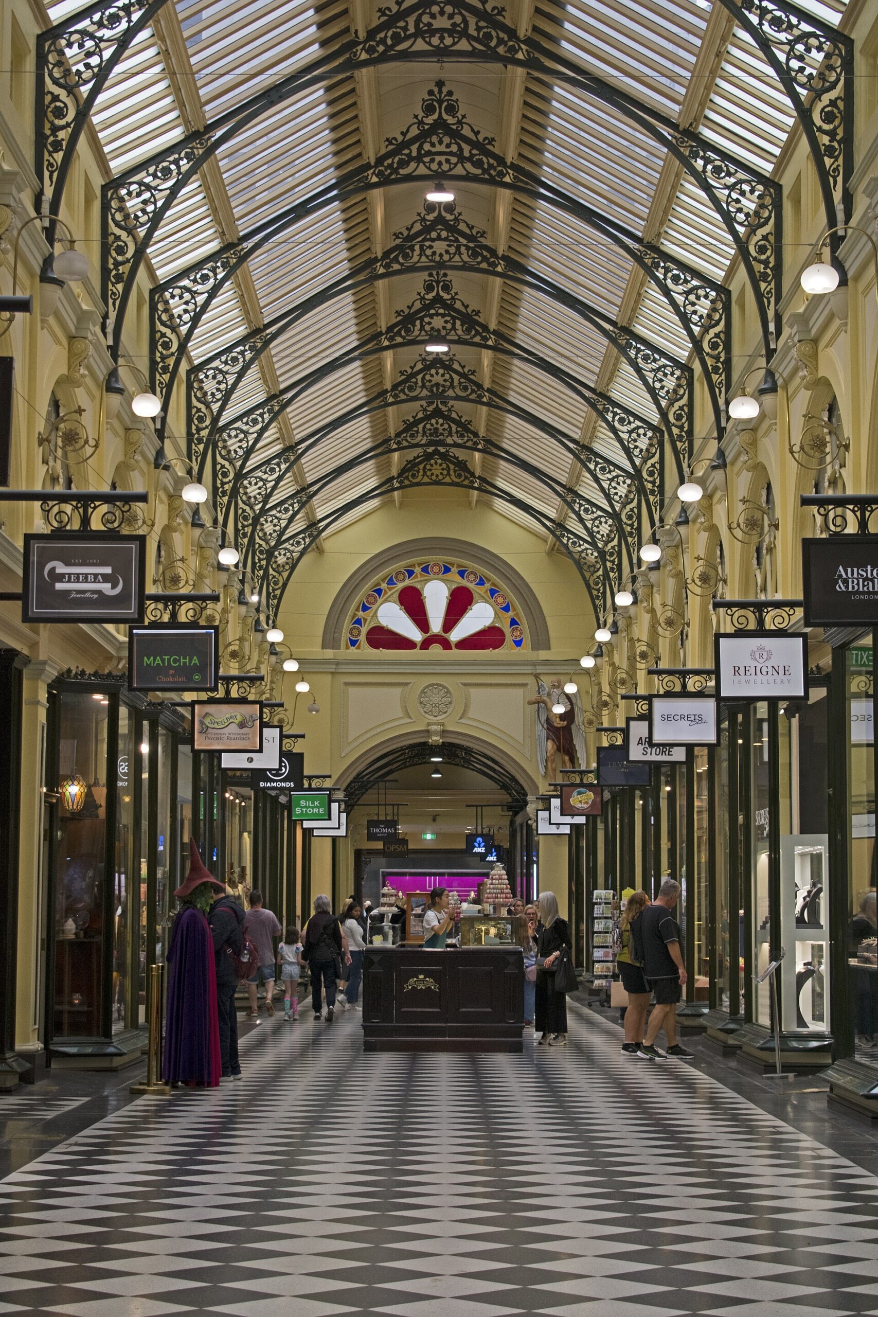 Royal Arcade Melbourne interior with tiled floor and independent shops