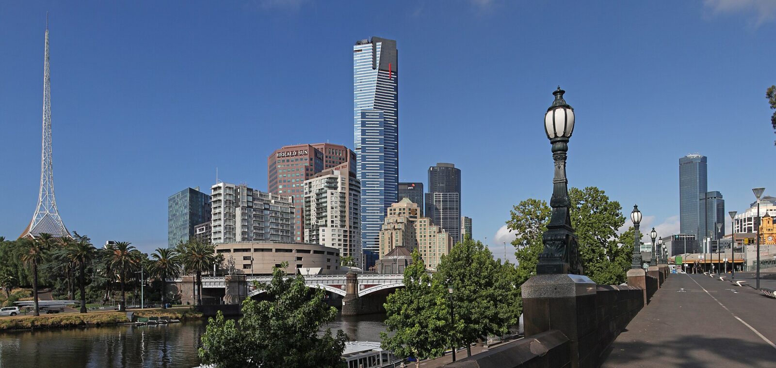 Eureka Tower rising above Southbank with the Arts Centre spire and Princes Bridge over the Yarra River